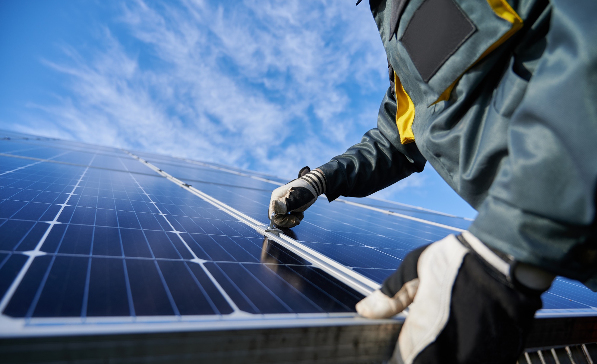 Image of a Solar techs installing new solar panels for solar tax credits in Albuquerque New Mexico